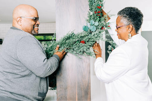 Married Couple Decorating for Christmas