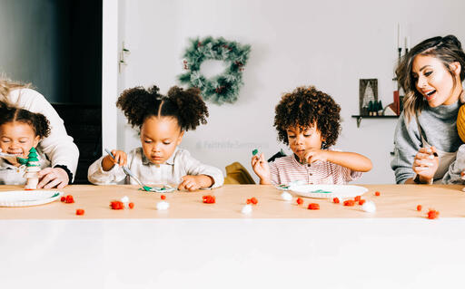 Family Doing a Christmas Craft Together