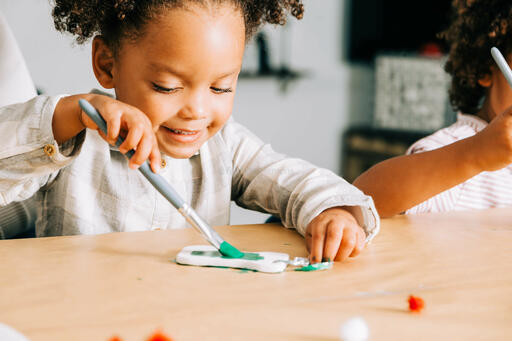 Child Doing a Christmas Craft