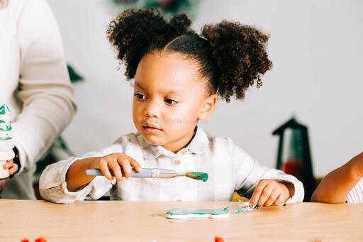 Child Doing a Christmas Craft