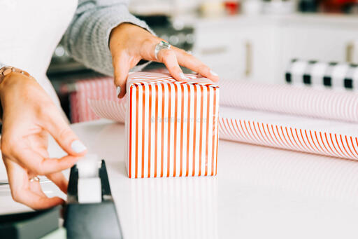 Woman Wrapping a Christmas Present