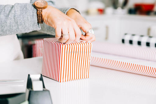 Woman Wrapping a Christmas Present