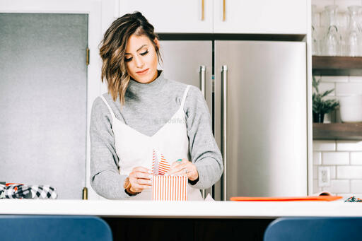 Woman Wrapping a Christmas Present