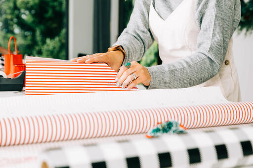 Woman Wrapping a Christmas Present