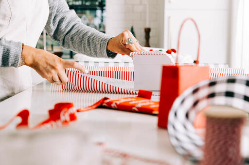 Woman Wrapping a Christmas Present