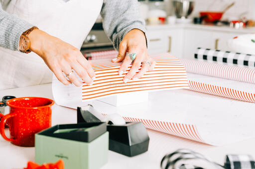 Woman Wrapping a Christmas Present