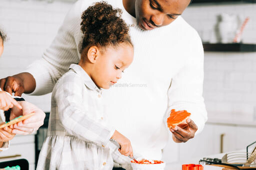 Father and Daughter Frosting Christmas Cookies