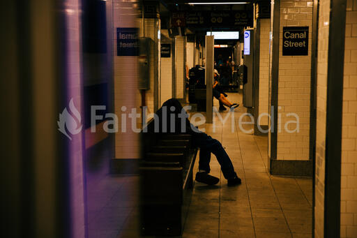 Homeless Man in Subway Station