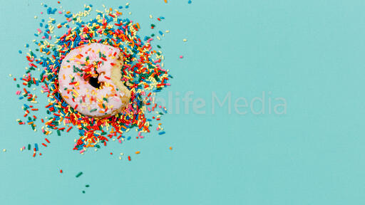 Frosted donut with sprinkles