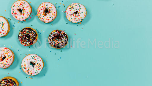 Frosted donuts with sprinkles