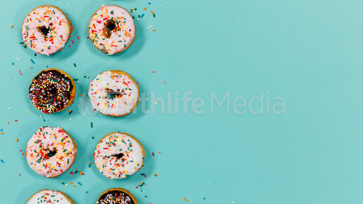 Frosted donuts with sprinkles