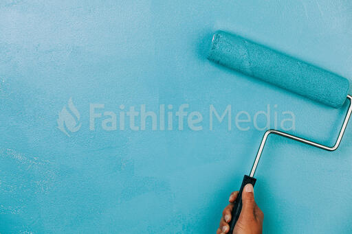 Hand Painting a Wall Blue