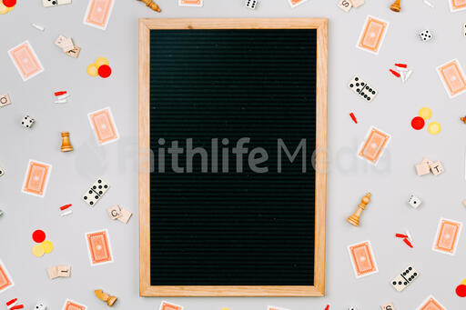 Letterboard Surrounded by Game Pieces