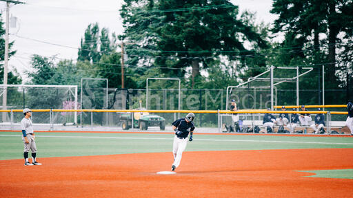 Baseball Player Running on the Field