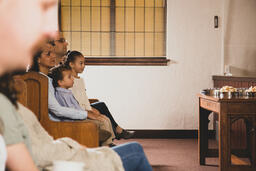 Families Seated in Pews During Church Service  image 2