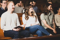 Church Congregation Members Laughing During Service  image 2