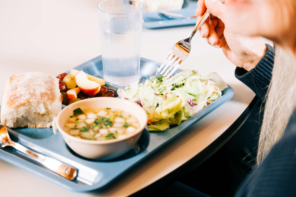 Woman Eating a Meal large preview