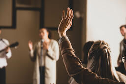 Woman with Her Hands Raised During Worship  image 3