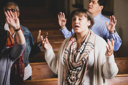 Woman Worshipping on a Sunday Morning  image 3