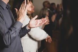 People Clapping at Church  image 3