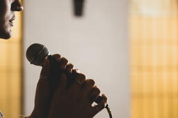 Worship Leader Holding Microphone  image 4