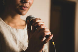 Worship Leader Holding Microphone  image 2