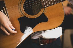 Person Playing Acoustic Guitar  image 2