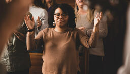 Woman Worshipping on a Sunday Morning  image 2