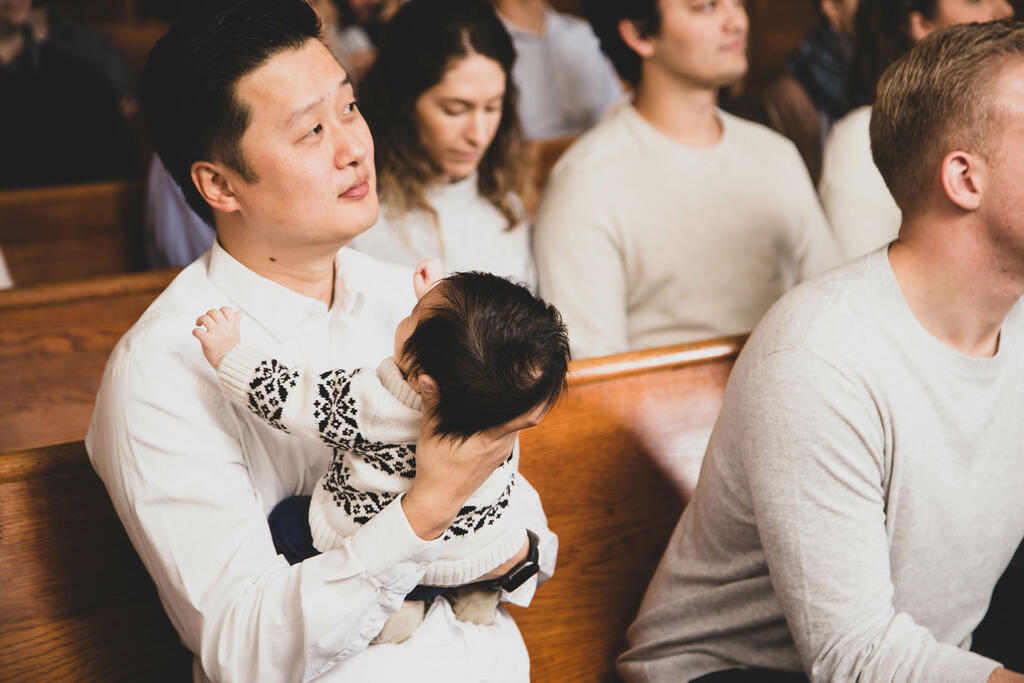 Father Holding Baby at Church large preview