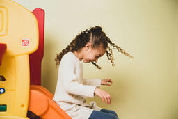 Young Girl on a Slide  image 4