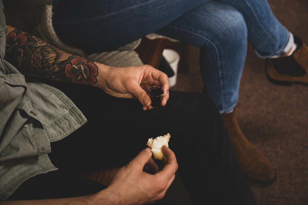 Man Holding Communion Elements large preview