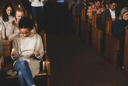 Congregation Praying Together Before Communion  image 2