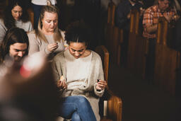 Congregation Praying Together Before Communion  image 3