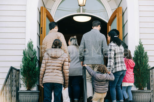 Congregation Members Entering Church on a Sunday Morning