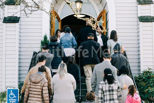 Congregation Members Entering Church on a Sunday Morning