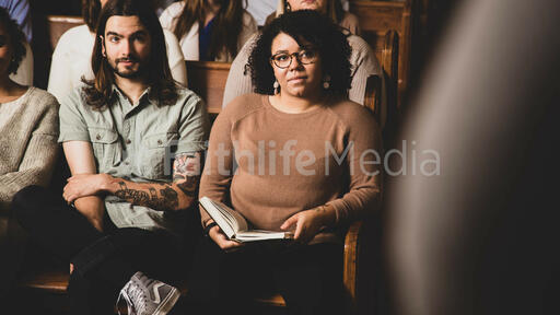 Congregation Members Listening During Church Service
