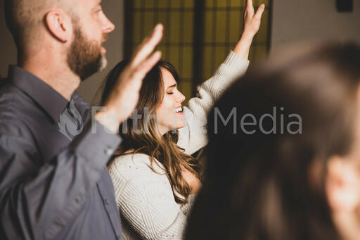 Woman Worshipping on a Sunday Morning