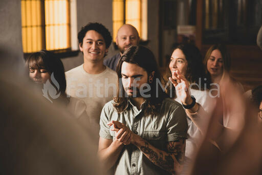 Man Worshipping on a Sunday Morning