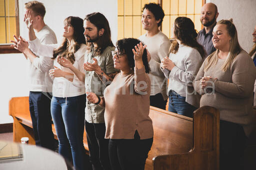 Congregation Members During Worship on a Sunday Morning
