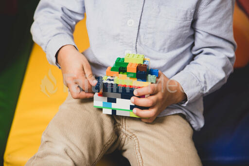 Boy Playing with Legos