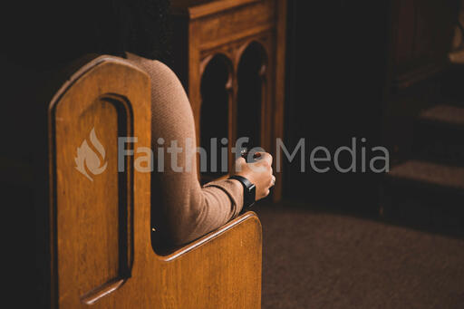Woman Holding Juice During Communion