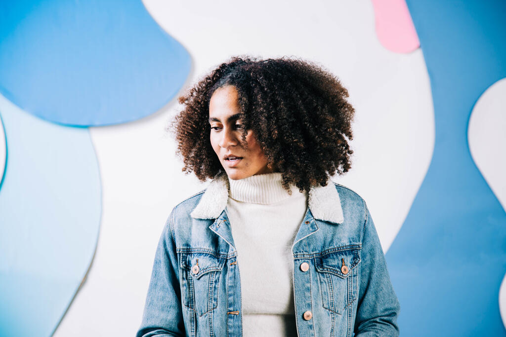 Young Woman Looking Off to the Side large preview