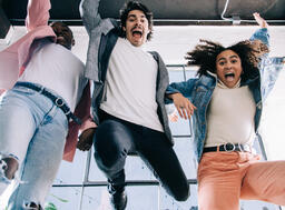Young People Laughing and Jumping  image 2