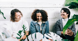 Young People Sitting Together and Laughing  image 1
