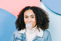 Young Woman Blowing Bubble Gum  image 4