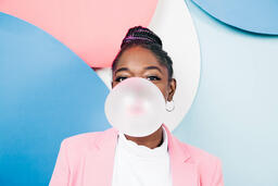 Young Woman Blowing Bubble Gum  image 1