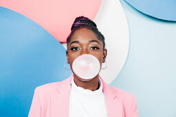 Young Woman Blowing Bubble Gum  image 3