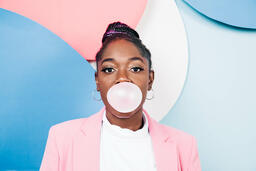 Young Woman Blowing Bubble Gum  image 2