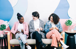 Young People Drinking Coffee and Laughing Together  image 3