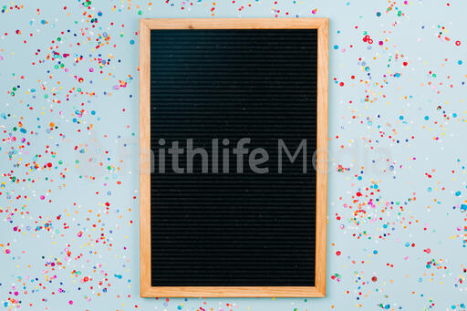 Letterboard Surrounded by Confetti